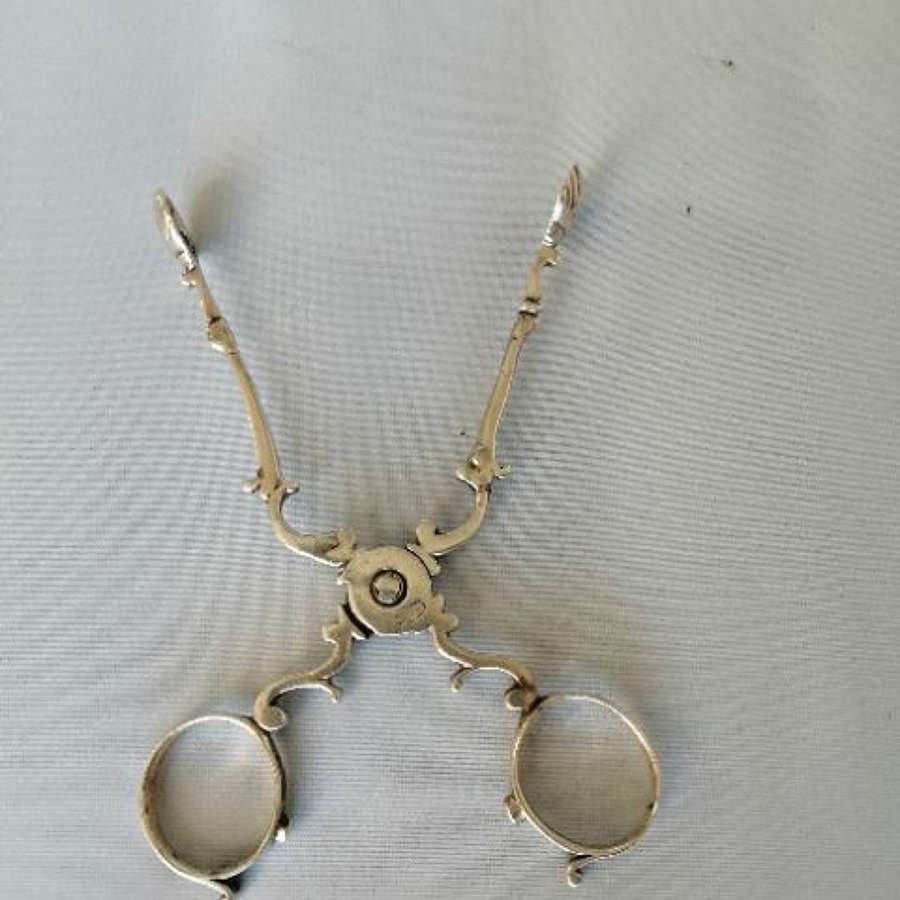 An Excellent Pair Of 18th Century Silver Sugar Nips