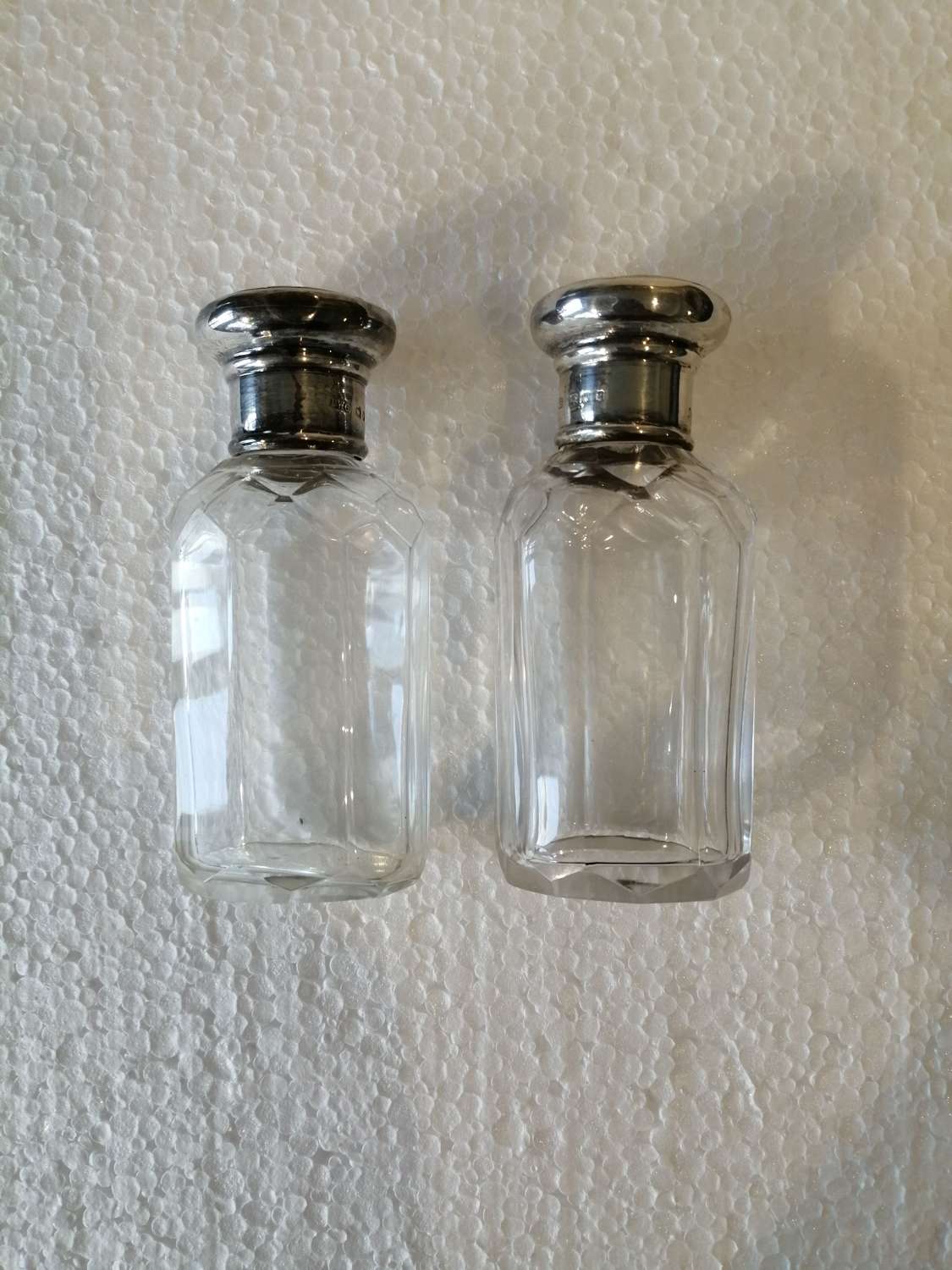 Pair silver topped scent bottles
