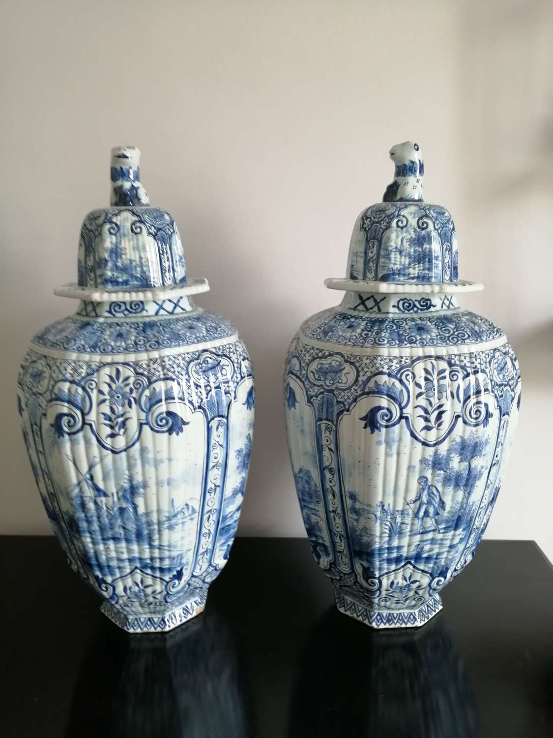 A large and impressive pair of Dutch Delft Blue & White vases & covers