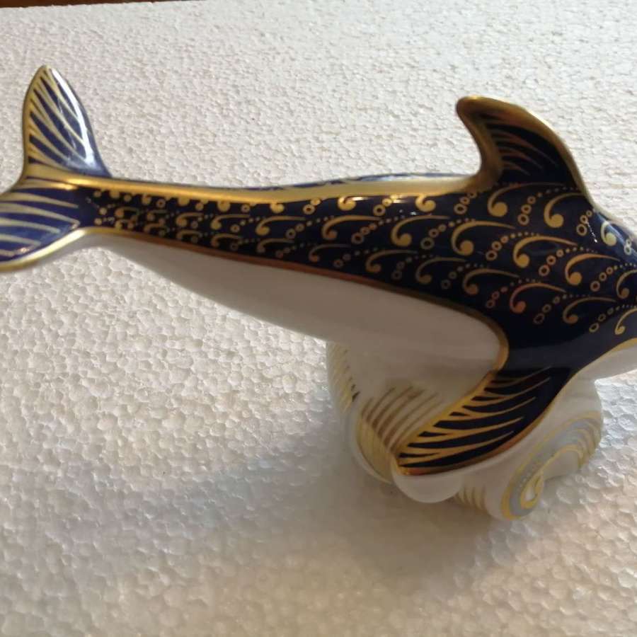 A Royal Crown Derby dolphin paperweight