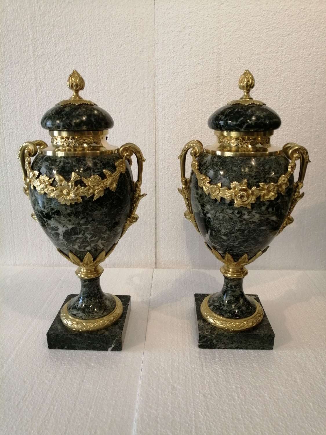 A beautiful pair of marble cassolettes