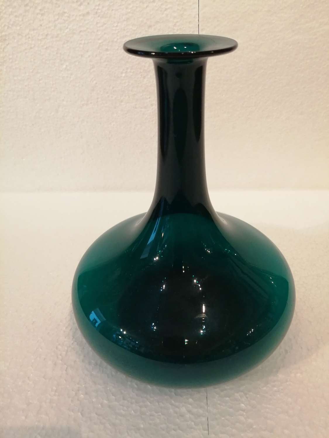 A 19th century peacock blue mell shaped decanter