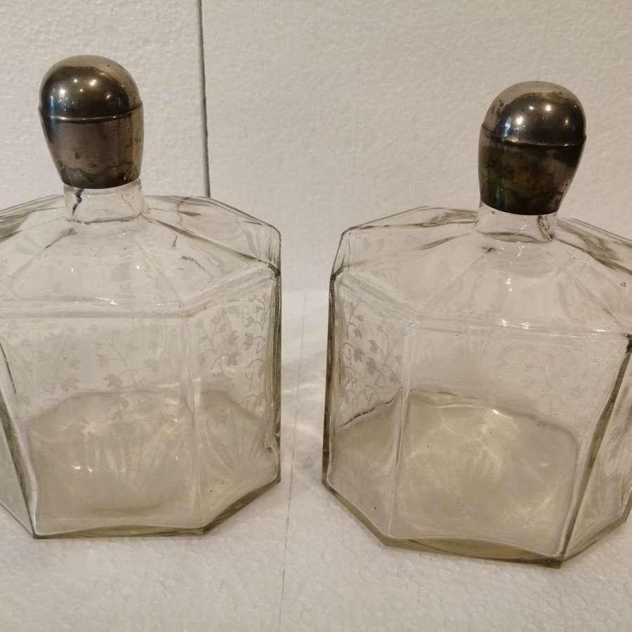 An unusual pair of 19th century cologne bottles