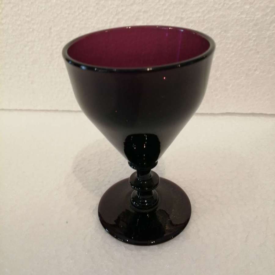 An exquisite amethyst glass goblet