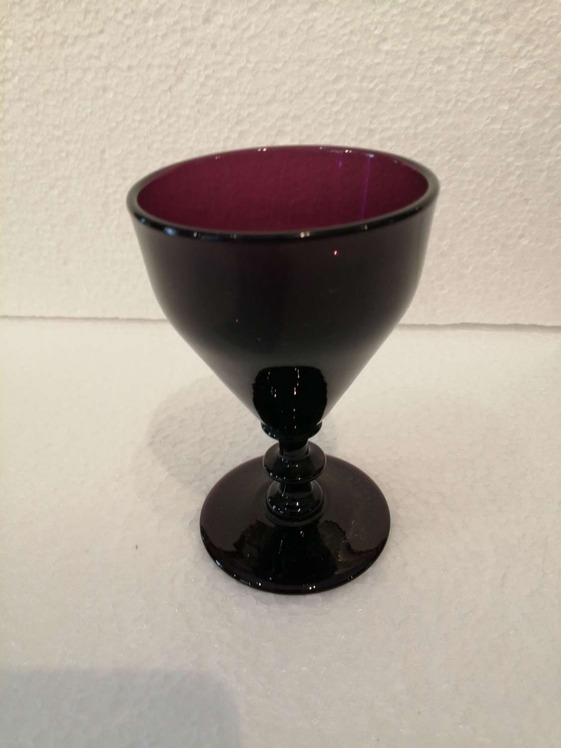 An exquisite amethyst glass goblet