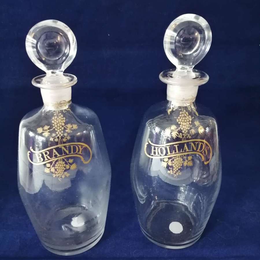 A fantastic pair of Georgian blown glass decanters