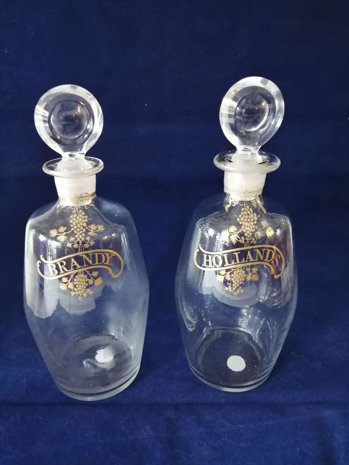 A fantastic pair of Georgian blown glass decanters