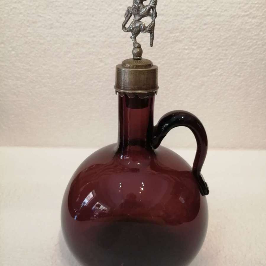 A 19th century pale amethyst glass flagon/decanter