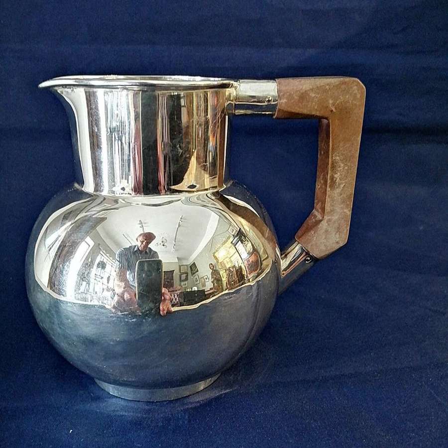 A fine quality silver water jug