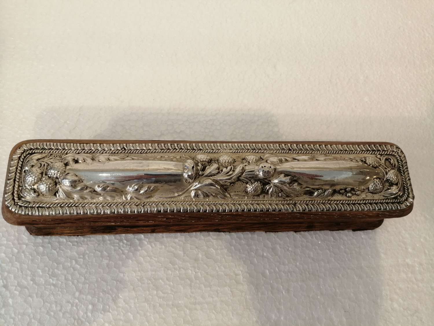 An Arts & Crafts silver topped oblong box