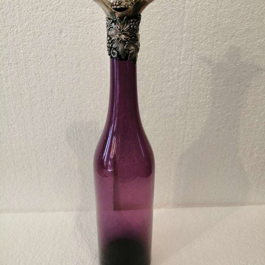 A beautiful amethyst 19th century wine bottle