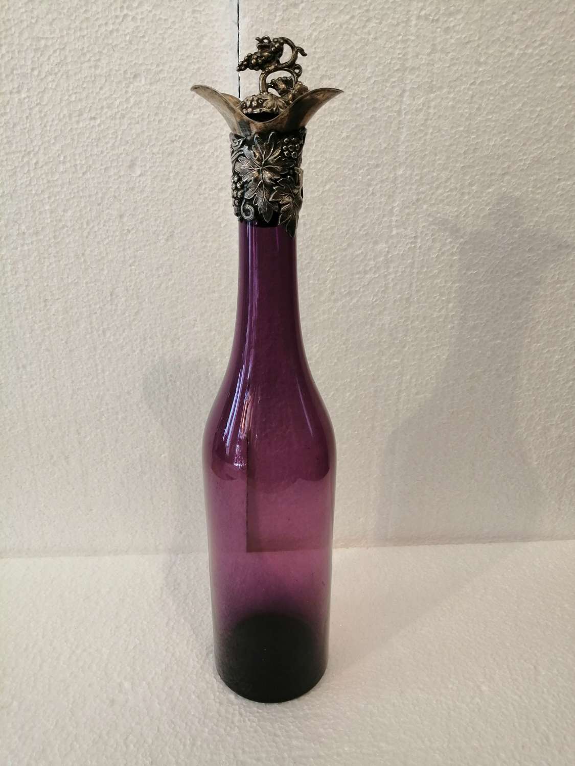 A beautiful amethyst 19th century wine bottle