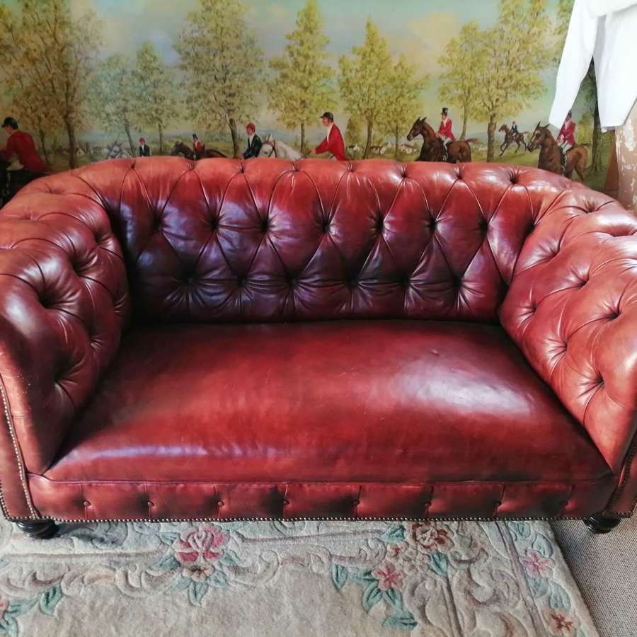 A 19th century red leather Chesterfield sofa