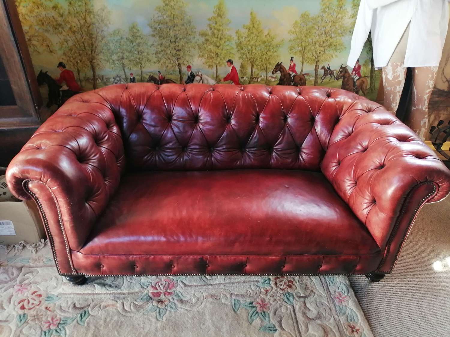 A 19th century red leather Chesterfield sofa