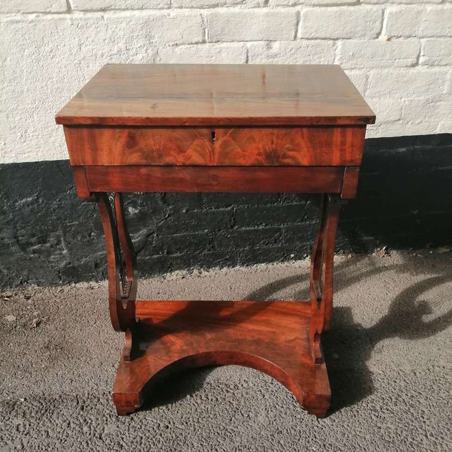 A fine quality mahogany work table