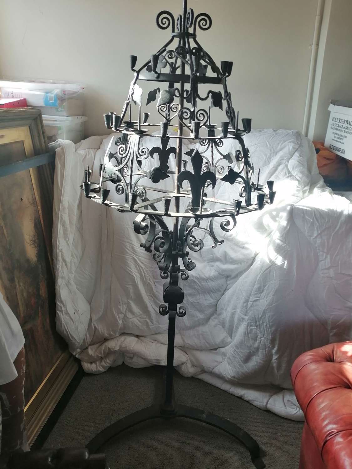 A large wrought iron floor standing candelabra candle stand, 