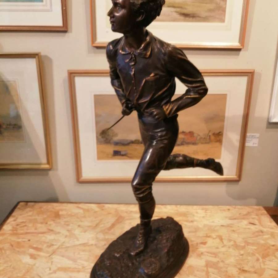 A fine quality French bronze of a running jockey