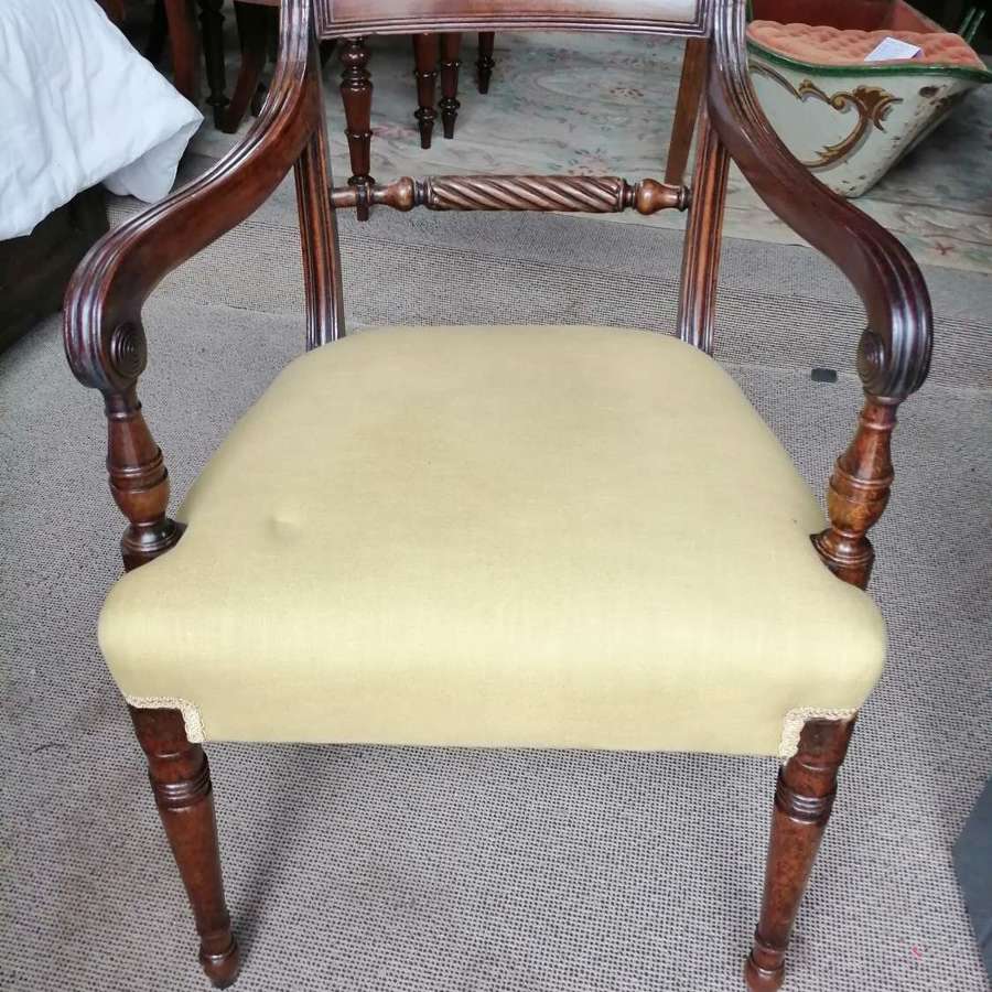 A Regency mahogany dining elbow chair
