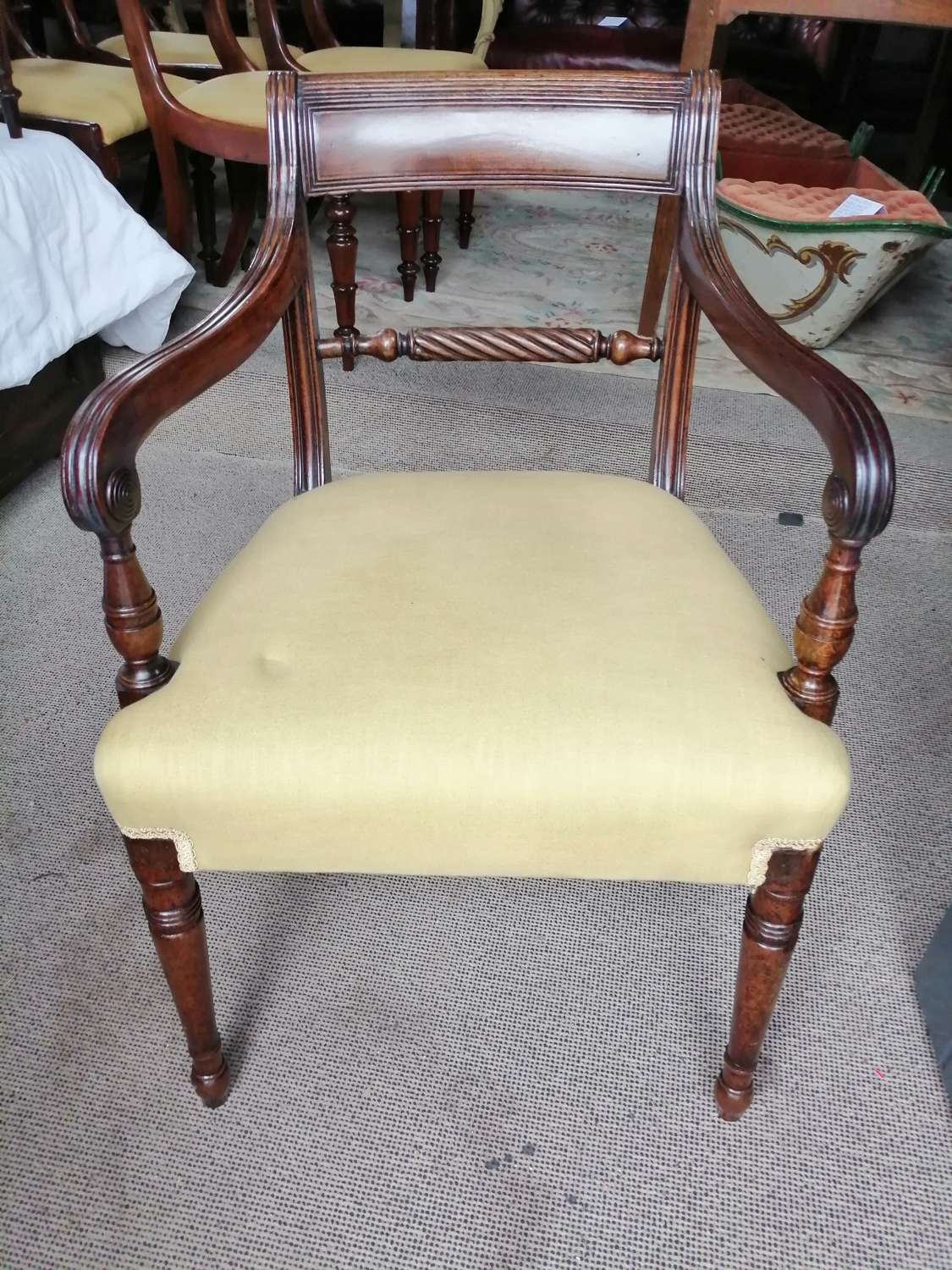 A Regency mahogany dining elbow chair
