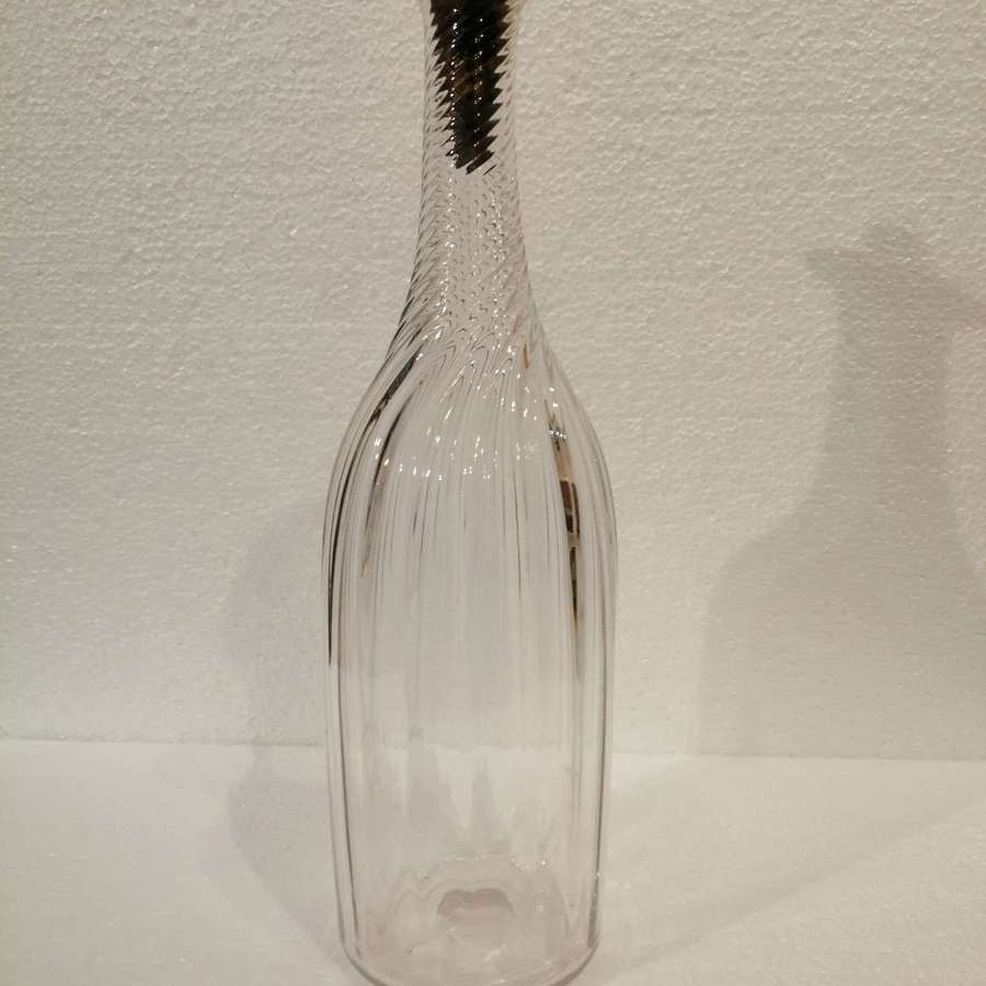 A 19th century clear glass ribbed  serving bottle/ decanter