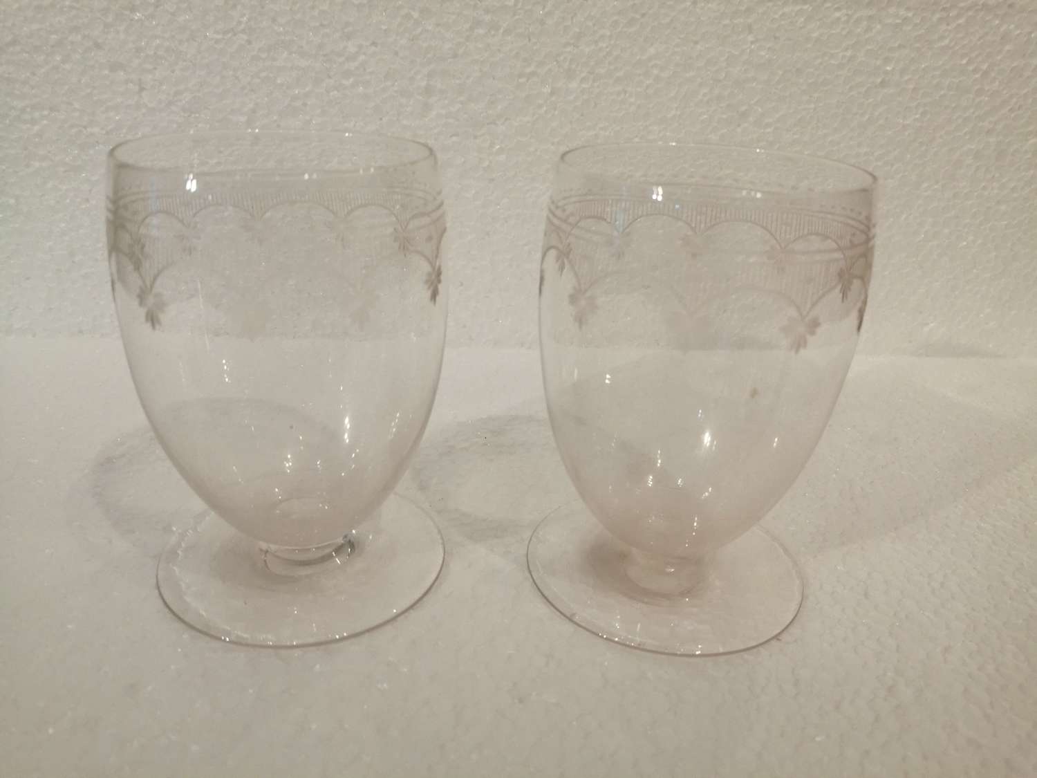 A charming pair of 19th century engraved lemonade glasses