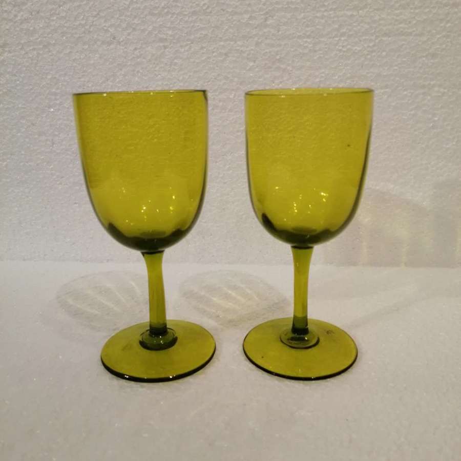 A lovely pair of 19th century lime green drinking glasses