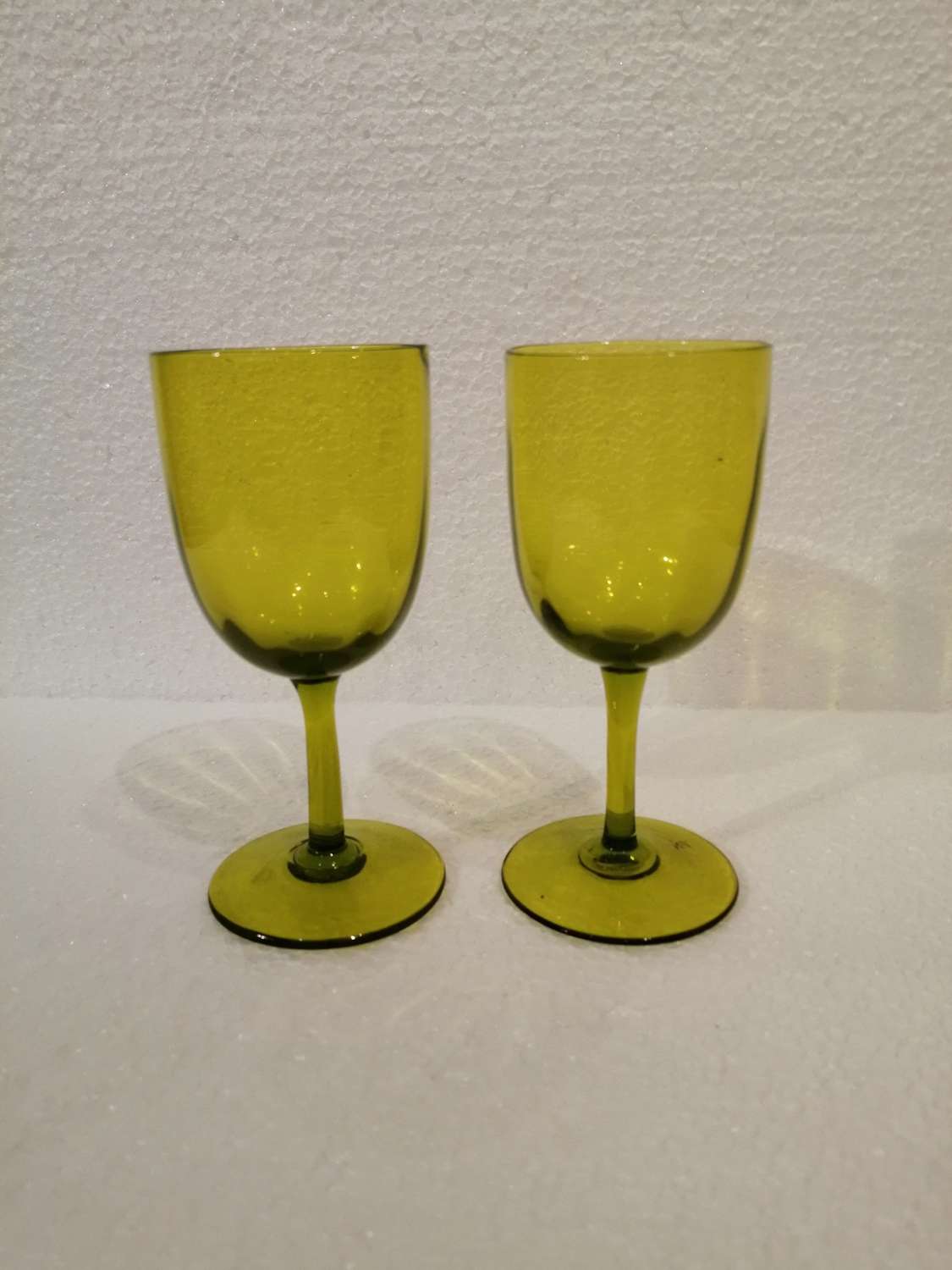 A lovely pair of 19th century lime green drinking glasses