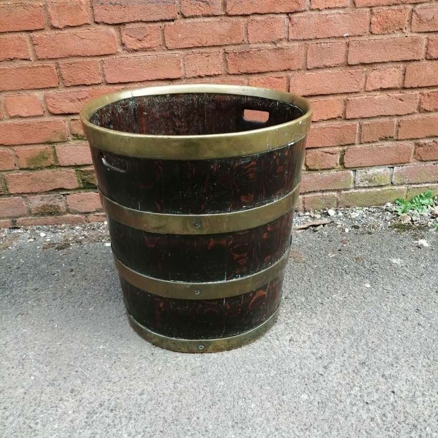 A 19th century Oak and brass bound ( log ) bin