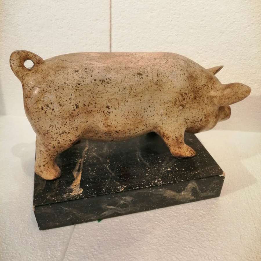 An appealing carved wooden folk art model of a pig