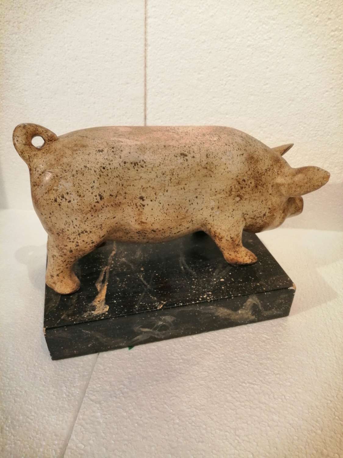 An appealing carved wooden folk art model of a pig