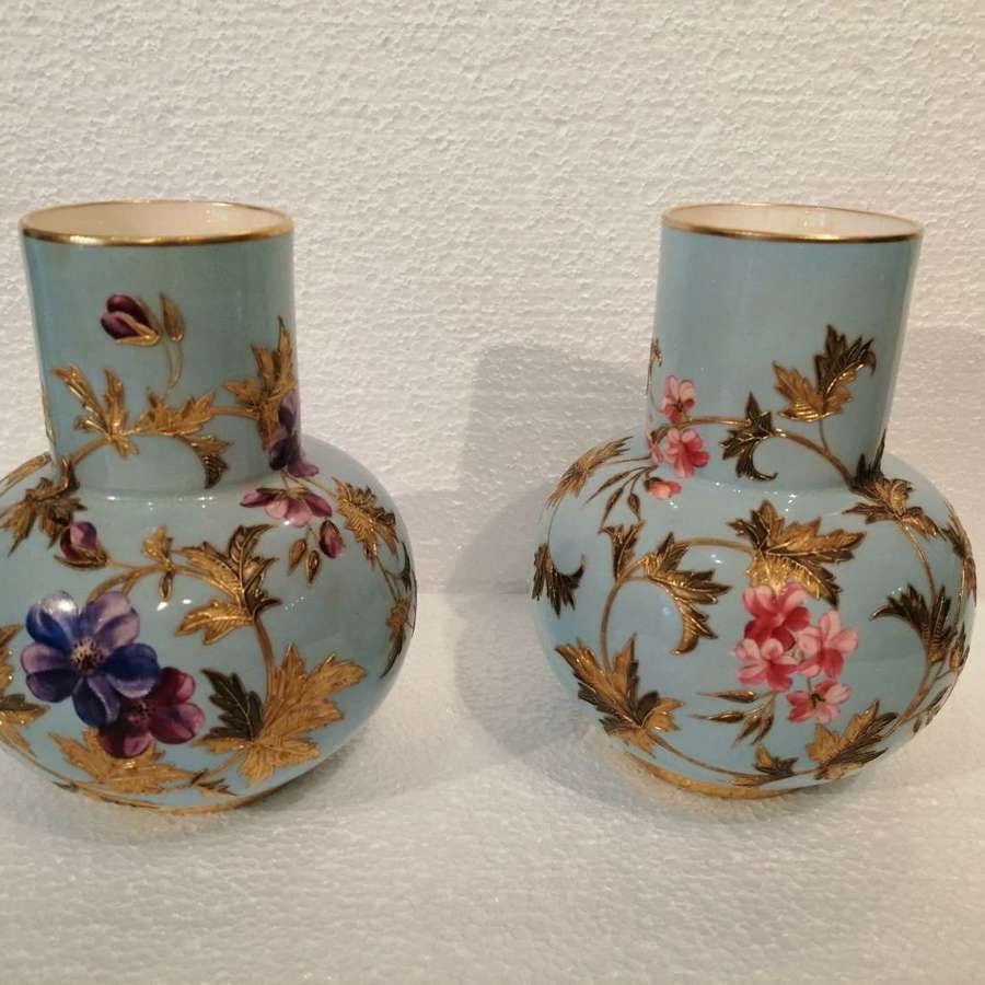 A fine quality pair of Royal Worcester vases