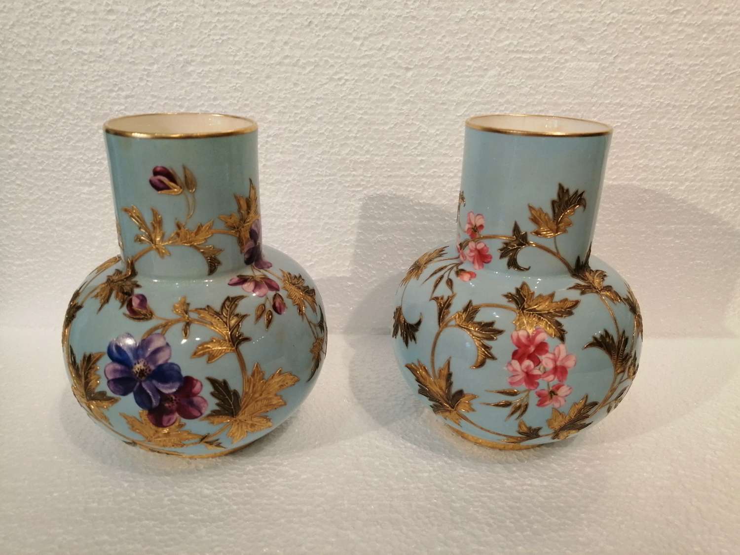 A fine quality pair of Royal Worcester vases