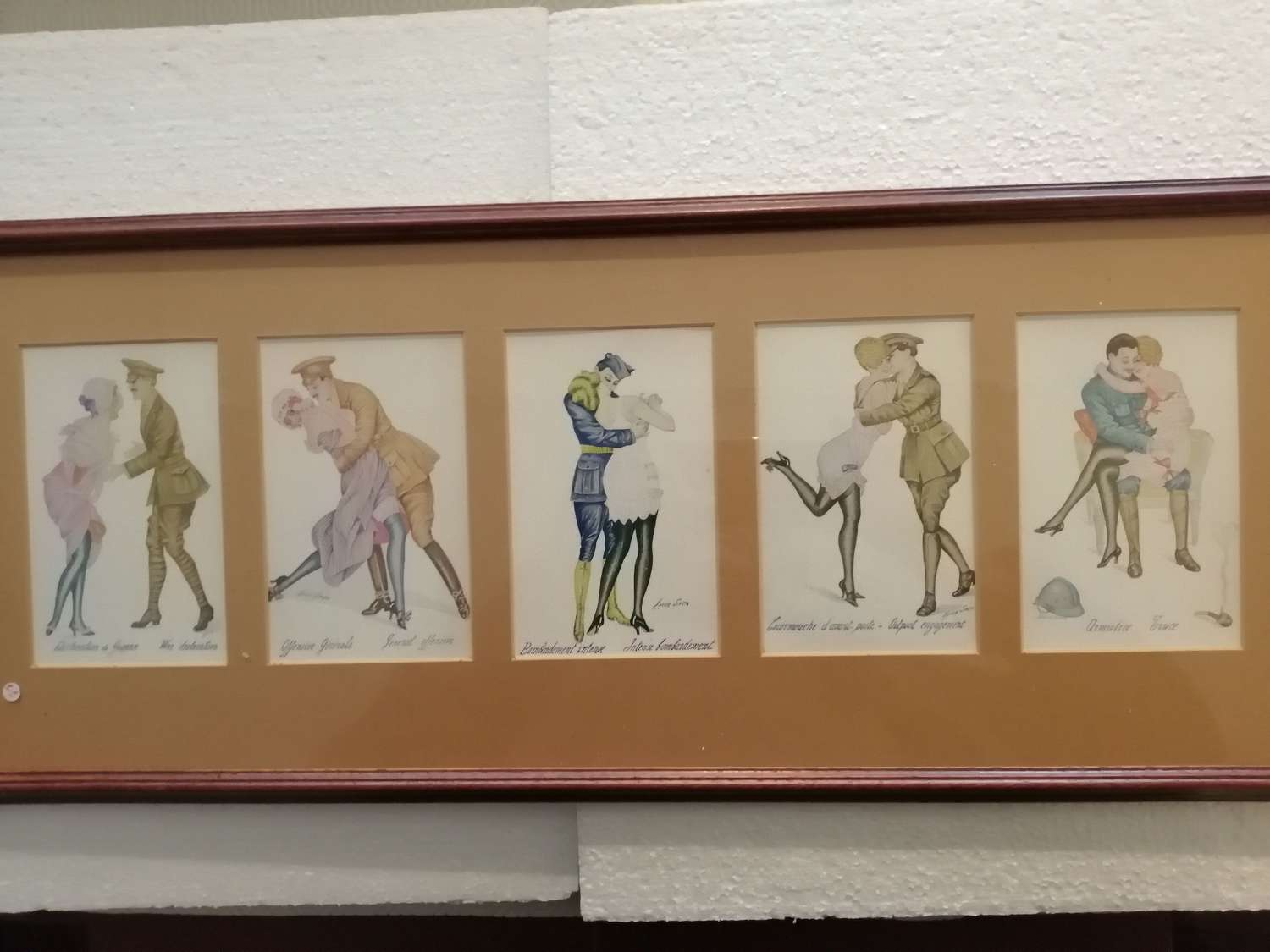 An original framed set of Xavier Sager La Guerre prints