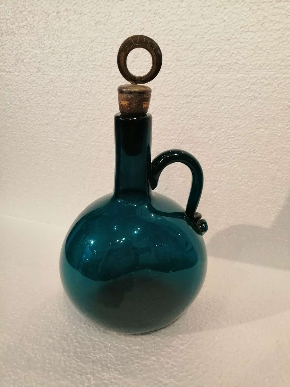 A lovely early 19th century peacock blue flagon/decanter