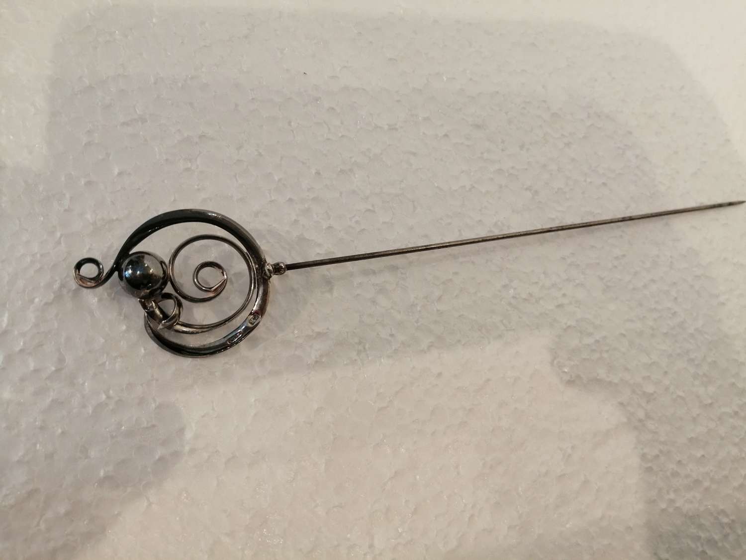 A silver Charles Horner hatpin