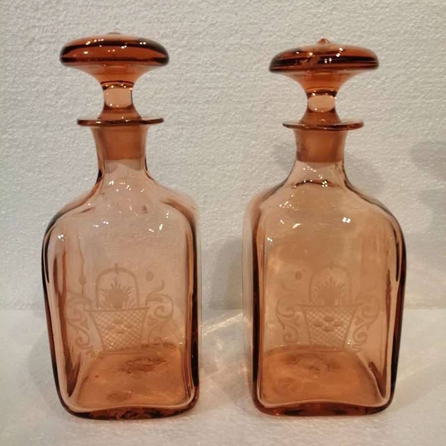 A fine quality pair of unusual coloured Georgian decanters