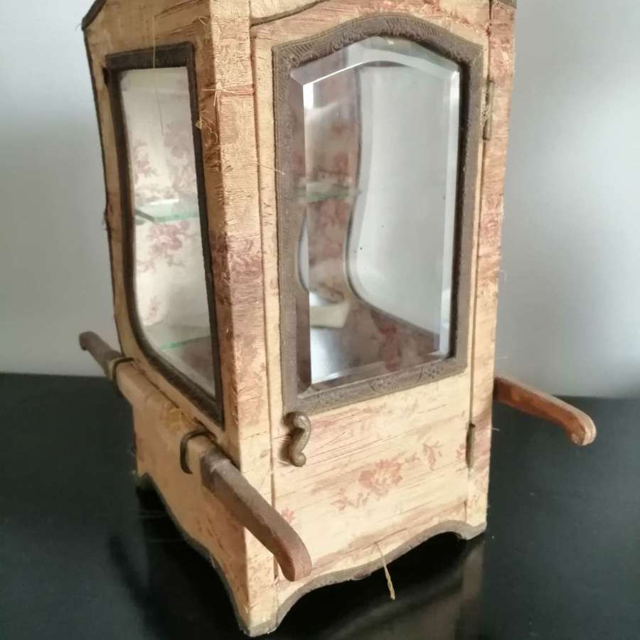 A late 19th century novelty vitrine modelled as a sedan chair
