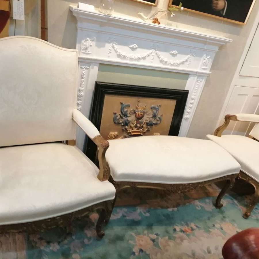 A suite of early 20th century French Fauteuils armchairs and stool