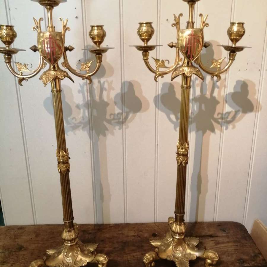 A stunning pair of 19th century Ecclesiastical candlesticks