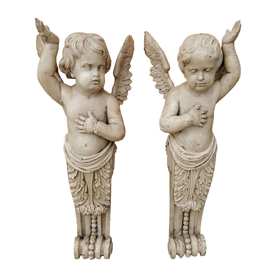 An extremely rare pair of 18th century carved wooden cherubs