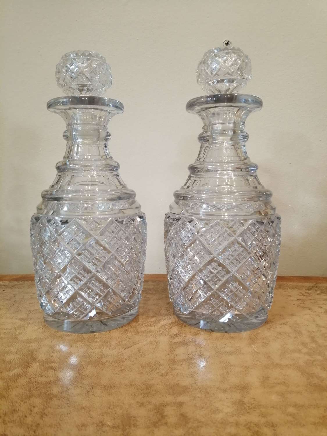 An excellent pair of 19th century triple ring cut glass decanters