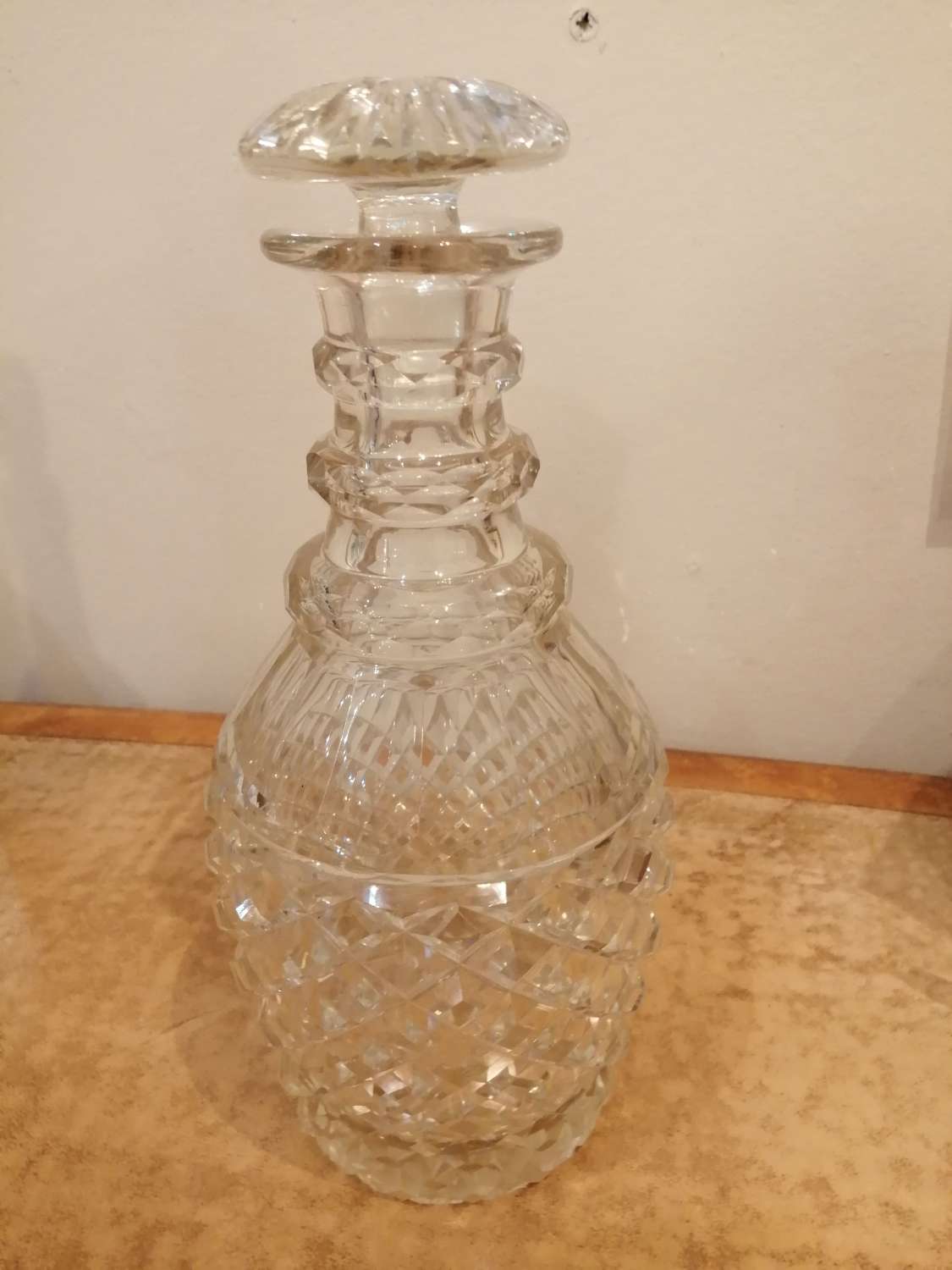 A good late Georgian cut glass decanter