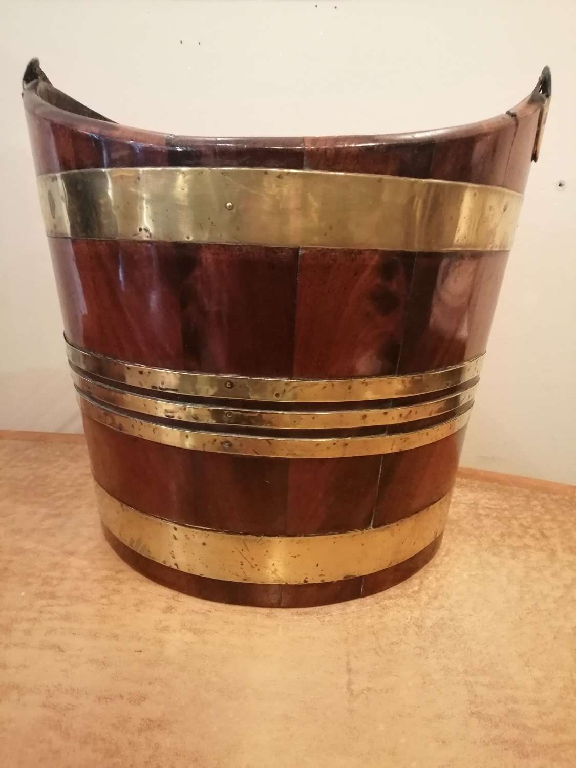 A Georgian mahogany brass bound bucket