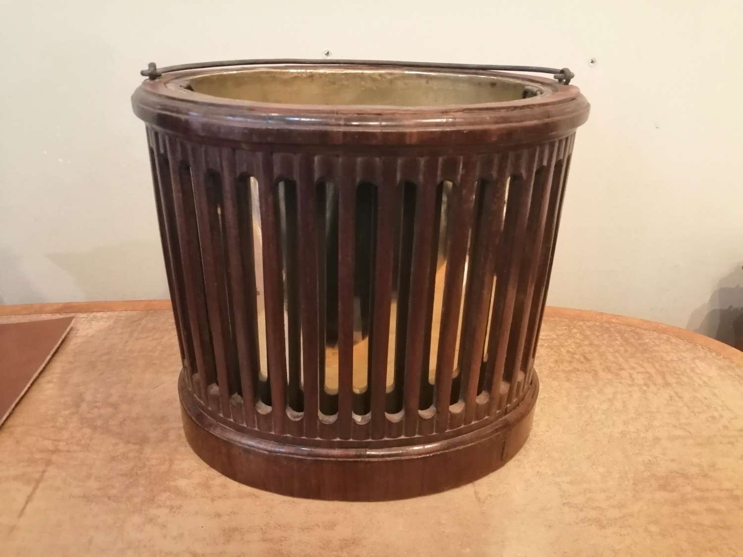 An 18th century mahogany slatted bucket