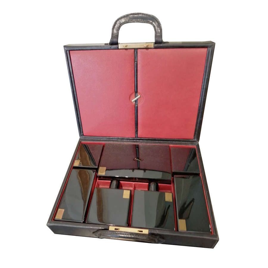 A fine quality Art Deco leather suitcase and dressing case