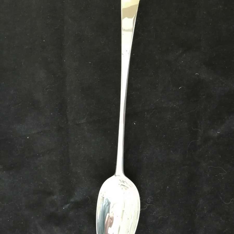A beautiful mid 18th century Irish silver stuffing serving spoon